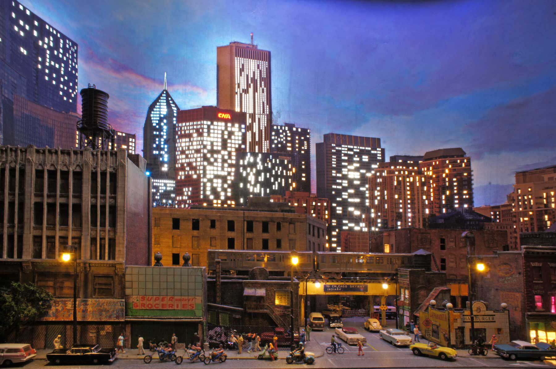 Diorama Chicago South Side bei Nacht mit beleuchteten Hochhäusern